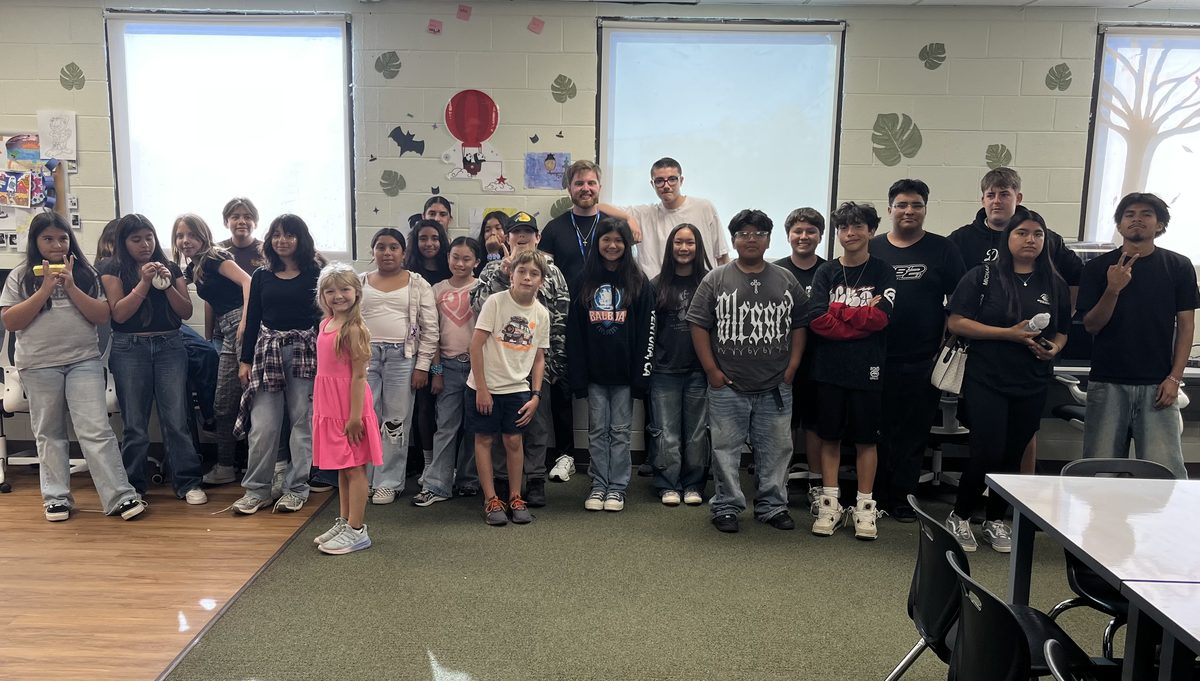 Luke Erickson with students after teaching an entrepreneurship class at the Boys & Girls Club of Greater Ventura